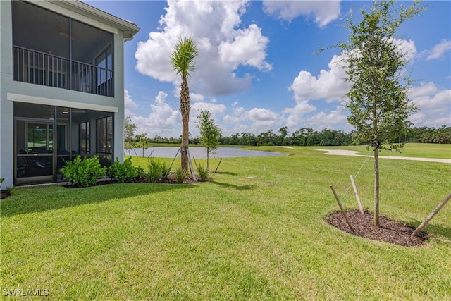 14818 Birchwood Ct Unit 6412, Punta Gorda, FL 33955 - view of green lawn featuring a water view and a sunroom