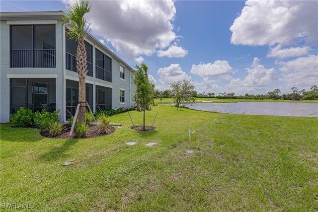 14818 Birchwood Ct Unit 6412, Punta Gorda, FL 33955 - view of green lawn with a water view
