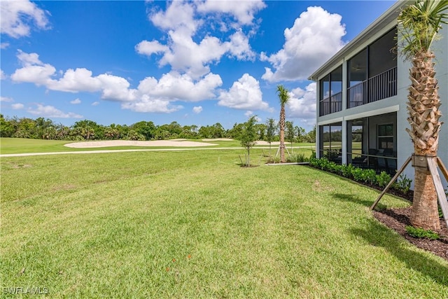 14818 Birchwood Ct Unit 6412, Punta Gorda, FL 33955 - view of grassy yard with golf course view and a sunroom