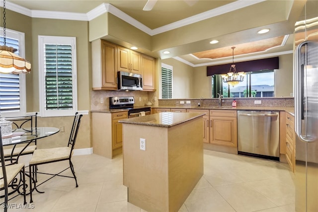 713 Regency Reserve Cir Unit 5903, Naples, FL 34119 - kitchen featuring stainless steel appliances, a chandelier, light brown cabinets, light stone counters, and crown molding