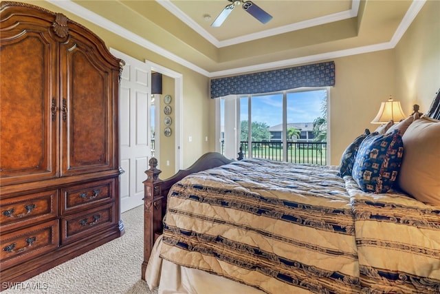 713 Regency Reserve Cir Unit 5903, Naples, FL 34119 - carpeted bedroom with access to exterior, a raised ceiling, a ceiling fan, and crown molding