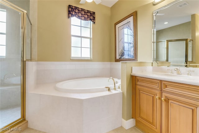 713 Regency Reserve Cir Unit 5903, Naples, FL 34119 - full bath with vanity, a bath, a stall shower, tile patterned flooring, and ceiling fan