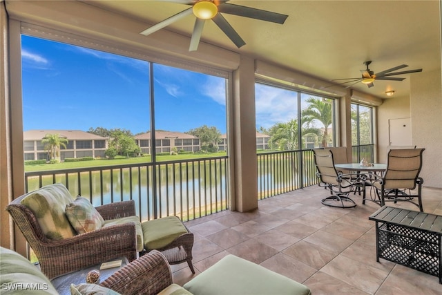 713 Regency Reserve Cir Unit 5903, Naples, FL 34119 - sunroom / solarium featuring a water view and a residential view