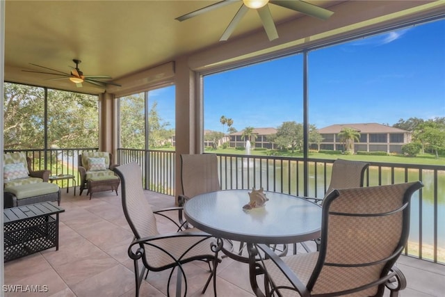 713 Regency Reserve Cir Unit 5903, Naples, FL 34119 - sunroom / solarium with ceiling fan, a water view, and healthy amount of natural light