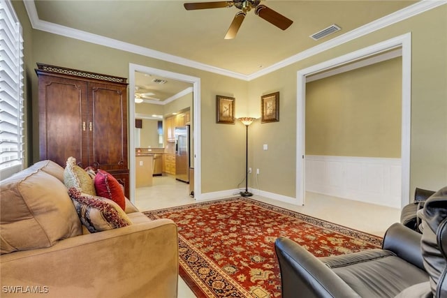 713 Regency Reserve Cir Unit 5903, Naples, FL 34119 - living area featuring ceiling fan, ornamental molding, and healthy amount of natural light