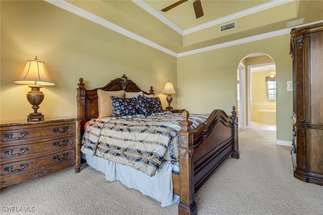 713 Regency Reserve Cir Unit 5903, Naples, FL 34119 - bedroom with arched walkways, light colored carpet, a raised ceiling, ceiling fan, and crown molding