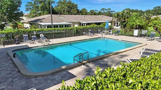 79 Glades Blvd Unit 1623, Naples, FL 34112 - community pool with a patio area