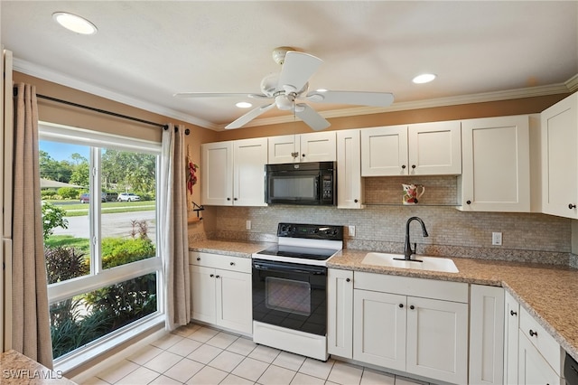 79 Glades Blvd Unit 1623, Naples, FL 34112 - kitchen featuring electric range, black microwave, crown molding, backsplash, and white cabinetry