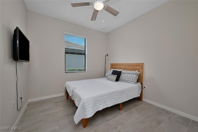 17573 Ashcomb Way, Estero, FL 33928 - bedroom with a ceiling fan and light tile patterned floors