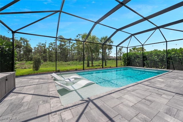 17573 Ashcomb Way, Estero, FL 33928 - outdoor pool featuring a patio area and glass enclosure