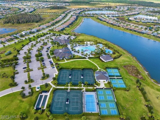 17573 Ashcomb Way, Estero, FL 33928 - aerial view of property's location featuring a large body of water and nearby suburban area