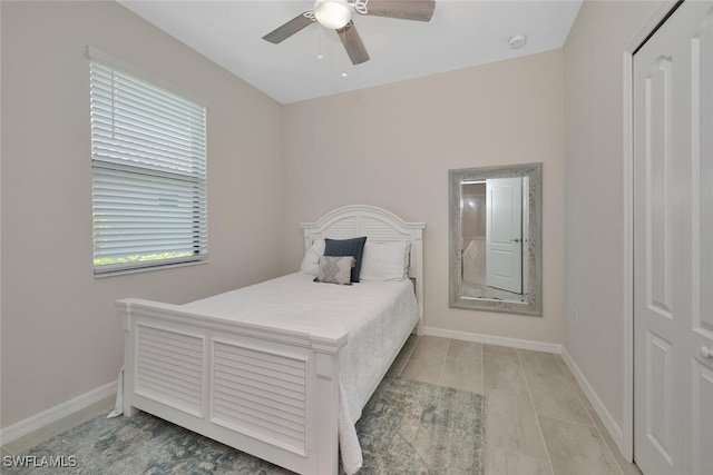 17573 Ashcomb Way, Estero, FL 33928 - bedroom featuring baseboards and a ceiling fan