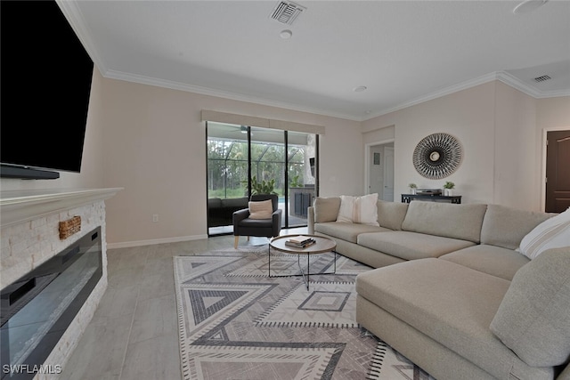 17573 Ashcomb Way, Estero, FL 33928 - living room with crown molding and a fireplace
