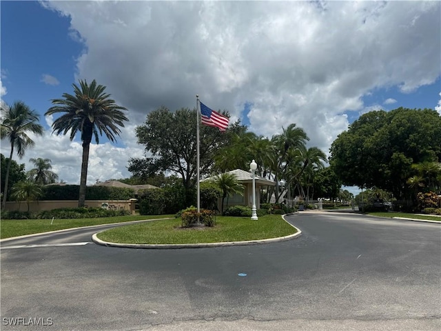 9973 Boca Ave N, Naples, FL 34109 - view of asphalt street featuring curbs