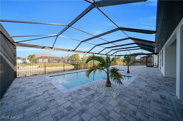 1502 SW 17th Ave, Cape Coral, FL 33991 - view of swimming pool with a patio and glass enclosure