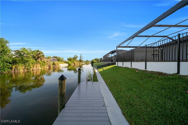 1502 SW 17th Ave, Cape Coral, FL 33991 - dock with a lawn and a water view