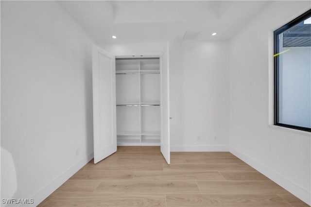 1502 SW 17th Ave, Cape Coral, FL 33991 - unfurnished bedroom featuring recessed lighting, light wood finished floors, and a closet