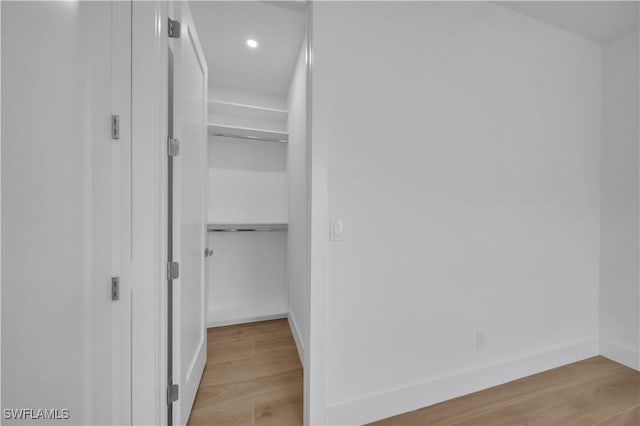 1502 SW 17th Ave, Cape Coral, FL 33991 - walk in closet featuring light wood-style floors