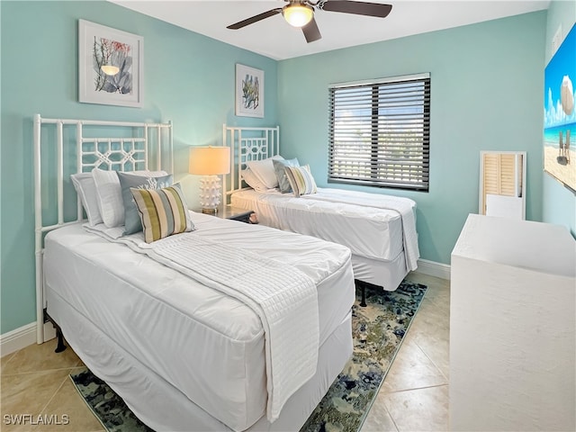 4770 Estero Blvd Unit 203, Fort Myers Beach, FL 33931 - bedroom with light tile patterned floors and a ceiling fan