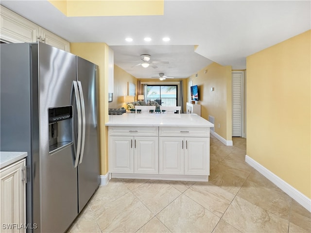 4770 Estero Blvd Unit 203, Fort Myers Beach, FL 33931 - kitchen featuring stainless steel fridge, light countertops, a ceiling fan, a peninsula, and recessed lighting