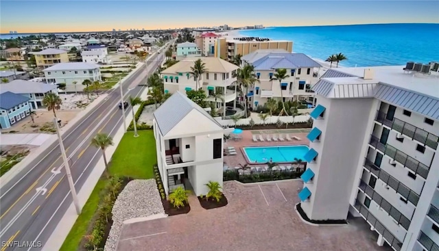 4770 Estero Blvd Unit 203, Fort Myers Beach, FL 33931 - drone / aerial view of a pool and a large body of water