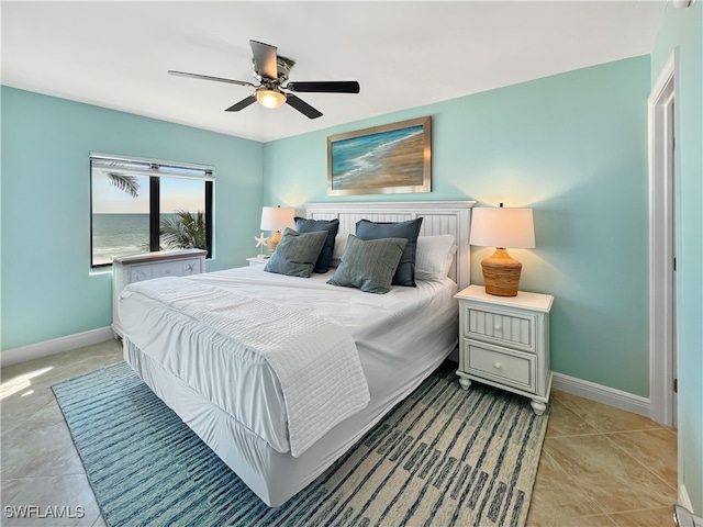 4770 Estero Blvd Unit 203, Fort Myers Beach, FL 33931 - tiled bedroom with baseboards and ceiling fan
