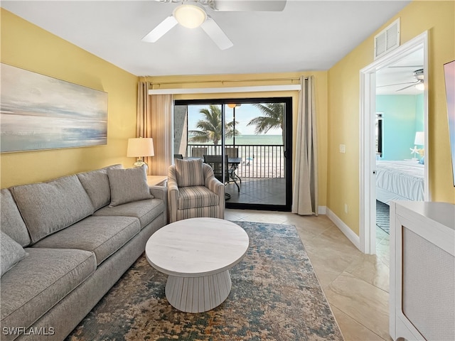 4770 Estero Blvd Unit 203, Fort Myers Beach, FL 33931 - living area with ceiling fan and baseboards
