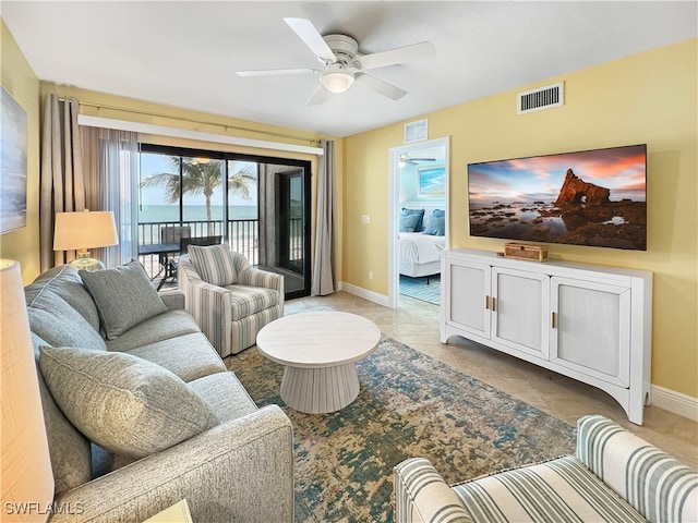 4770 Estero Blvd Unit 203, Fort Myers Beach, FL 33931 - living area with a ceiling fan and light tile patterned floors