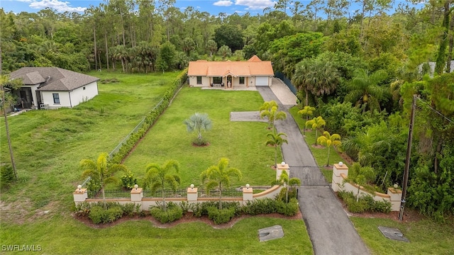 3270 14th Ave NE, Naples, FL 34120 - view from above of property with a heavily wooded area