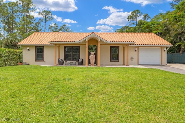 3270 14th Ave NE, Naples, FL 34120 - view of front of property with concrete driveway, a garage, stucco siding, and a tiled roof