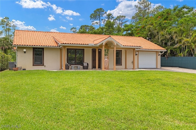 3270 14th Ave NE, Naples, FL 34120 - mediterranean / spanish house featuring a garage, concrete driveway, stucco siding, and a tiled roof