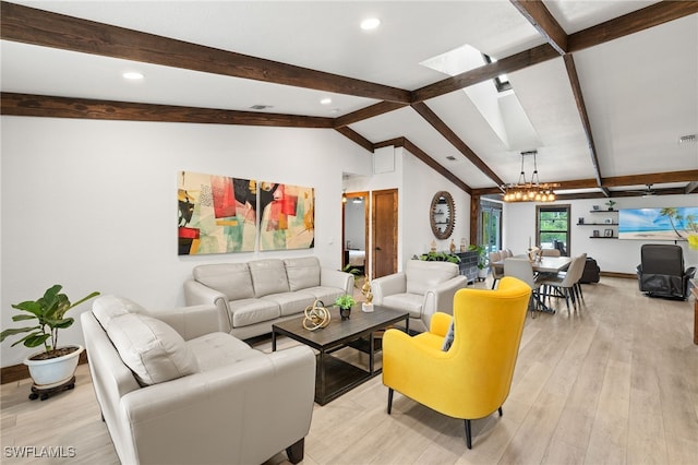 3270 14th Ave NE, Naples, FL 34120 - living room featuring a chandelier, light wood-type flooring, recessed lighting, and a skylight