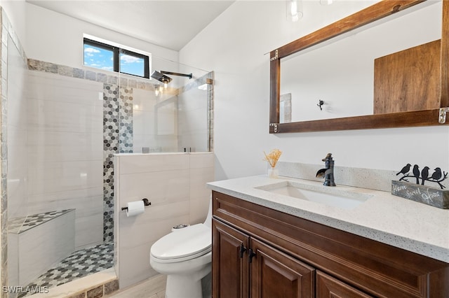 3270 14th Ave NE, Naples, FL 34120 - full bath featuring vanity, a walk in shower, and wood finished floors
