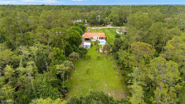 3270 14th Ave NE, Naples, FL 34120 - aerial view of property and surrounding area featuring a heavily wooded area
