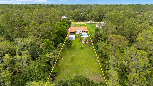 3270 14th Ave NE, Naples, FL 34120 - view from above of property featuring a heavily wooded area and property parcel outlined