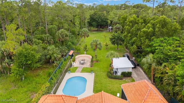3270 14th Ave NE, Naples, FL 34120 - view from above of property with a pool and a heavily wooded area