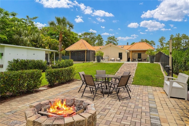 3270 14th Ave NE, Naples, FL 34120 - view of patio with an outdoor fire pit and outdoor dining area