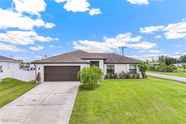 2619 42nd St SW, Lehigh Acres, FL 33976 - ranch-style house featuring stucco siding, a garage, concrete driveway, and a shingled roof