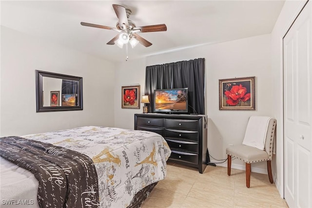 2619 42nd St SW, Lehigh Acres, FL 33976 - bedroom with a closet, light tile patterned floors, and ceiling fan