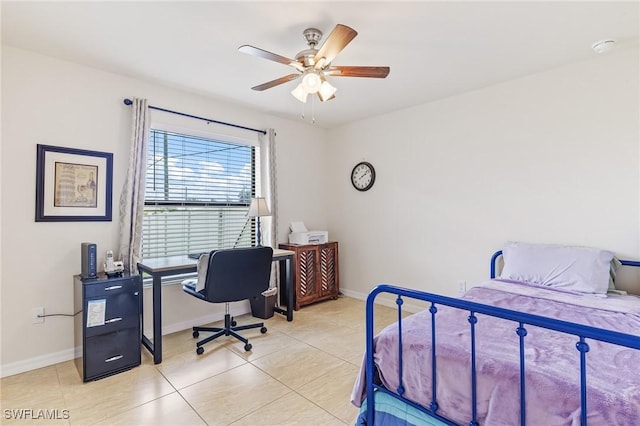 2619 42nd St SW, Lehigh Acres, FL 33976 - bedroom with a desk, light tile patterned floors, and a ceiling fan