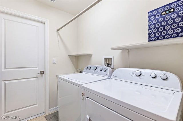 2619 42nd St SW, Lehigh Acres, FL 33976 - laundry room with washing machine and dryer