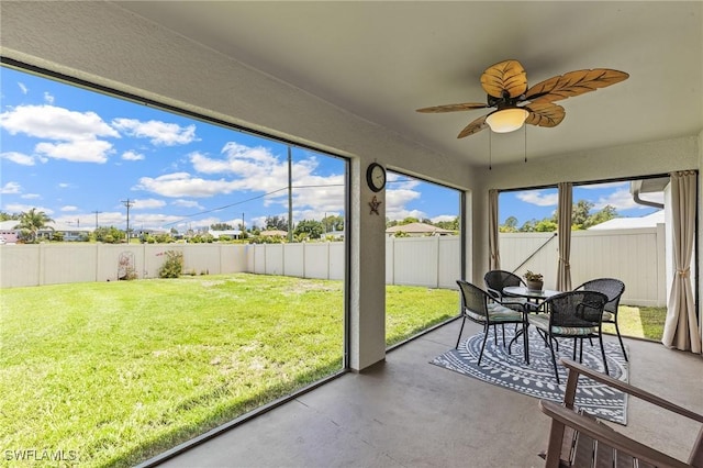 2619 42nd St SW, Lehigh Acres, FL 33976 - sunroom / solarium featuring a ceiling fan and outdoor dining area