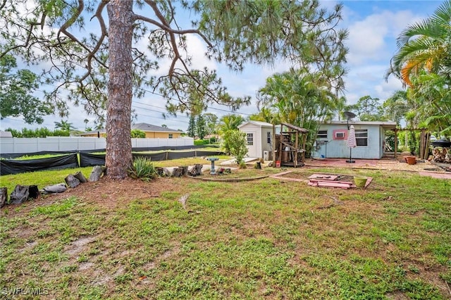 751 108th Ave N, Naples, FL 34108 - view of yard featuring an outbuilding