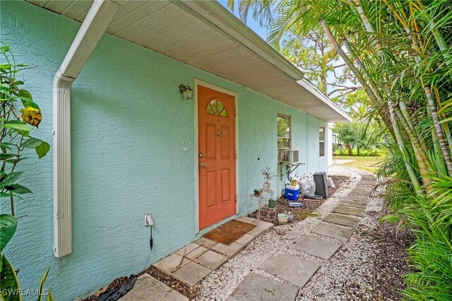 751 108th Ave N, Naples, FL 34108 - property entrance with stucco siding