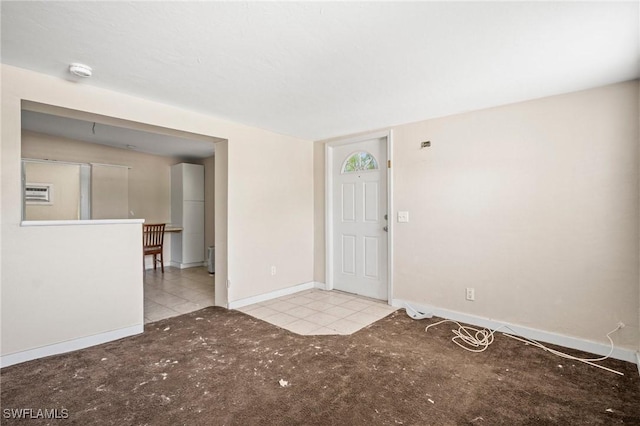 751 108th Ave N, Naples, FL 34108 - unfurnished room featuring a smoke detector, tile patterned flooring, and carpet