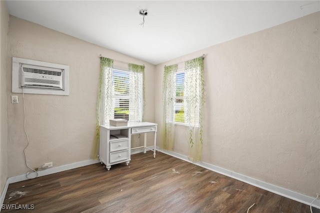 751 108th Ave N, Naples, FL 34108 - office area with wood finished floors, a wall mounted AC, and vaulted ceiling