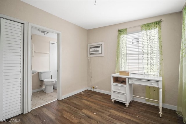 751 108th Ave N, Naples, FL 34108 - unfurnished office with a wall mounted air conditioner and dark wood-type flooring