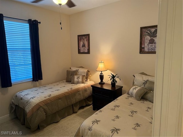 1520 SW 50th St Unit 101, Cape Coral, FL 33914 - bedroom featuring tile patterned floors and a ceiling fan