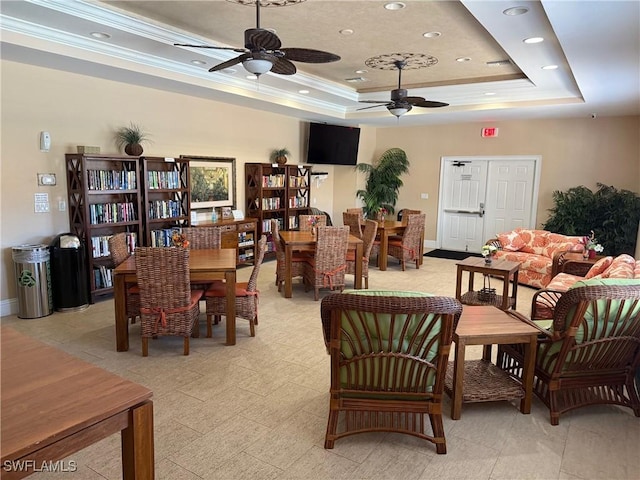 1520 SW 50th St Unit 101, Cape Coral, FL 33914 - dining space with a raised ceiling, a ceiling fan, crown molding, and recessed lighting