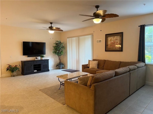 1520 SW 50th St Unit 101, Cape Coral, FL 33914 - living area with ceiling fan and light tile patterned floors